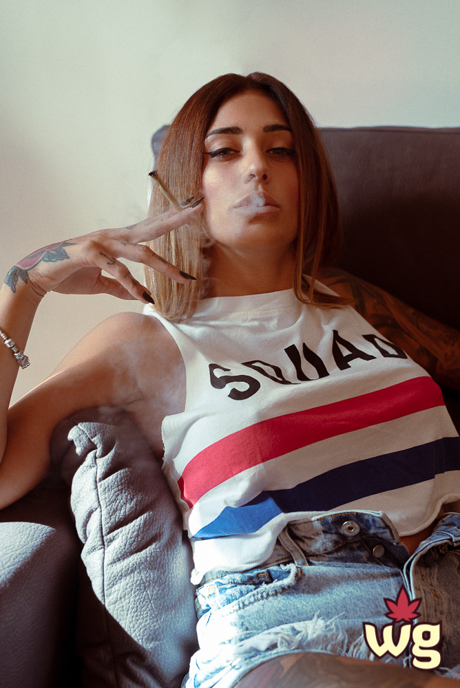 hot woman smoking cannabis on the couch | weed girls