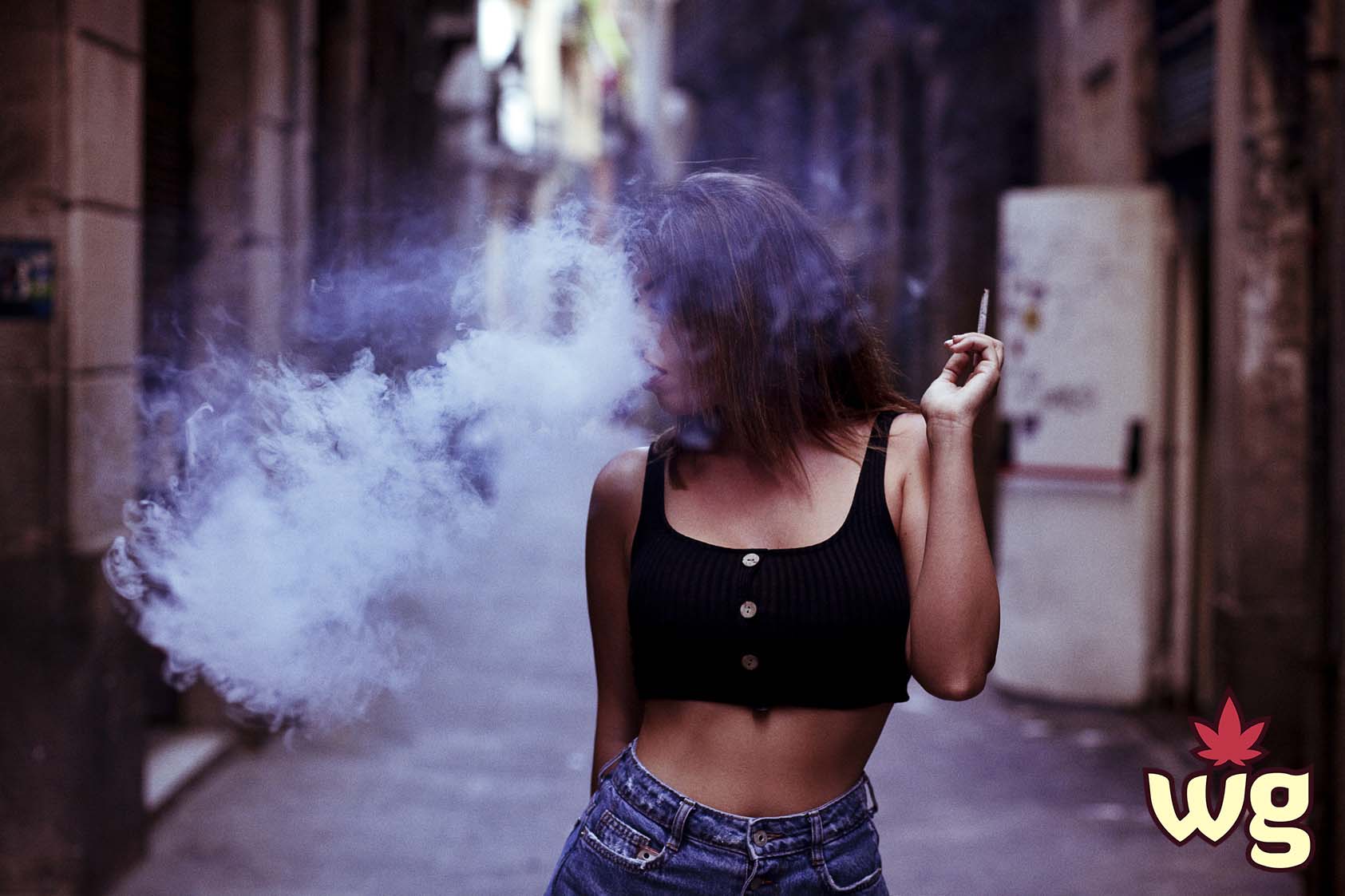 sexy woman in crop top getting high | Weed Girls